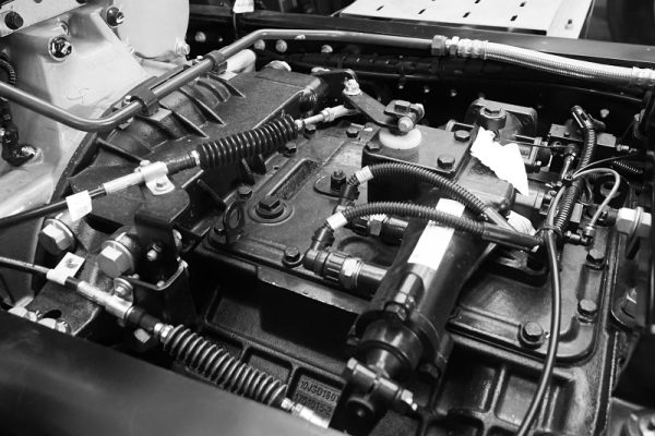 A close up view of truck’s engine compartment